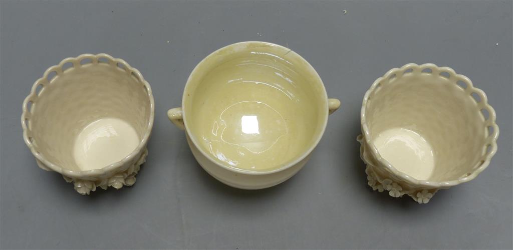 A Belleek cauldron and a pair of Belleek pots, tallest 6cm